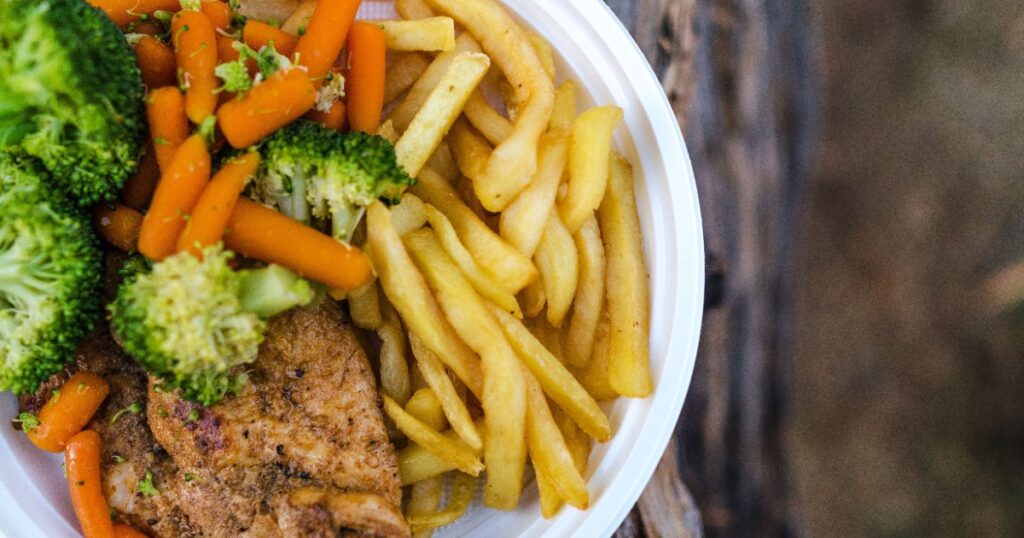 Crispy air fryer frozen vegetables plated with roasted broccoli and carrots