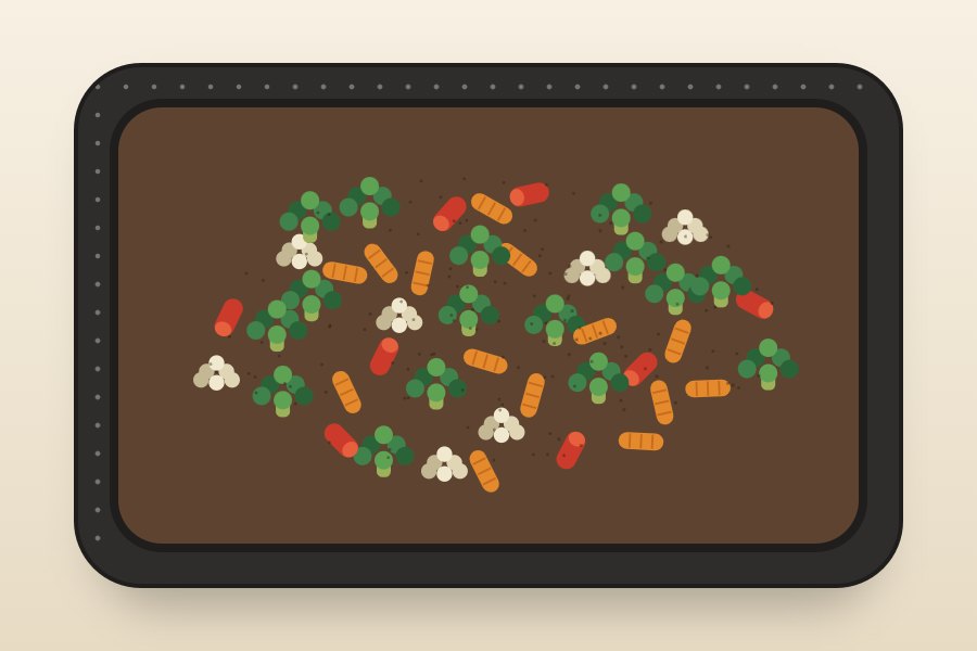 Air fryer frozen vegetables — top-down view of roasted broccoli, carrots, red peppers, and cauliflower in an air fryer basket