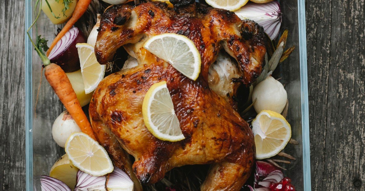 Sheet pan chicken and vegetables roasted on a baking tray for a quick weeknight dinner