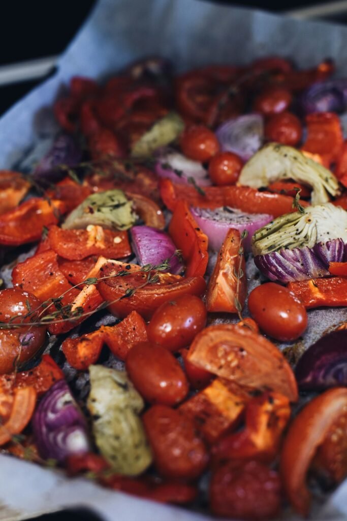 Colorful roasted vegetables for a sheet pan chicken dinner