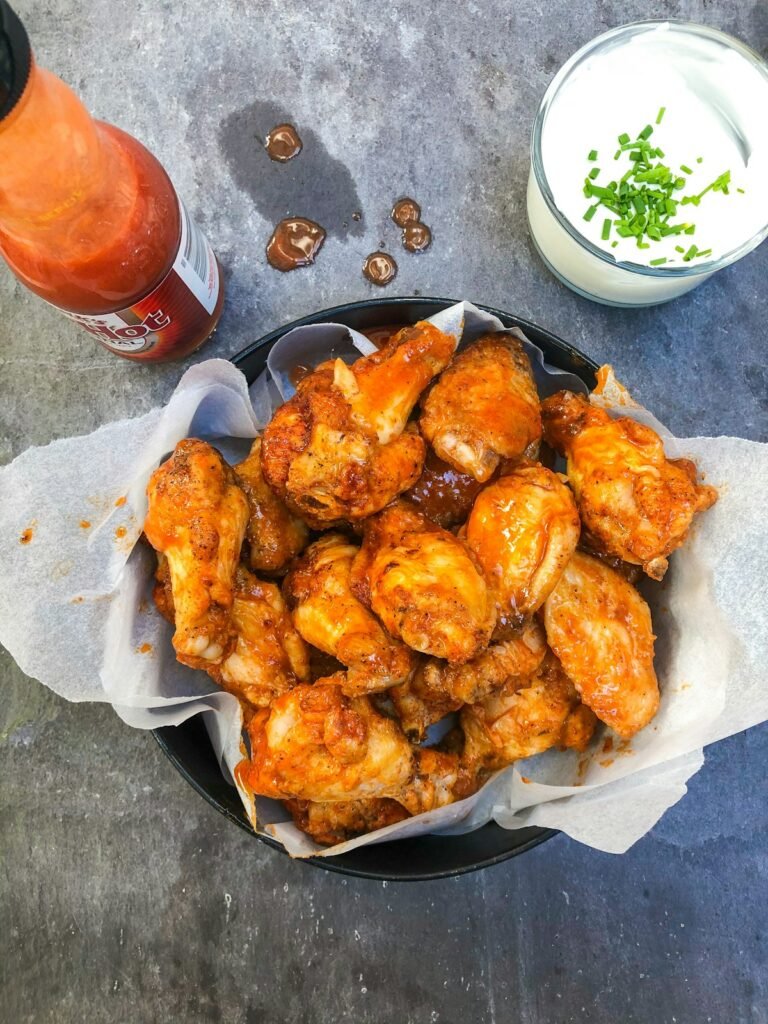 Crispy air fryer chicken wings served in a basket