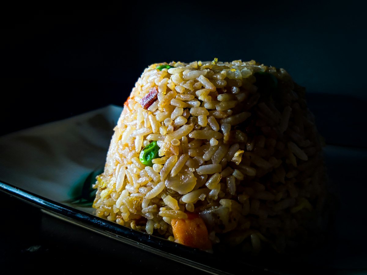 Easy homemade egg fried rice on a ceramic plate