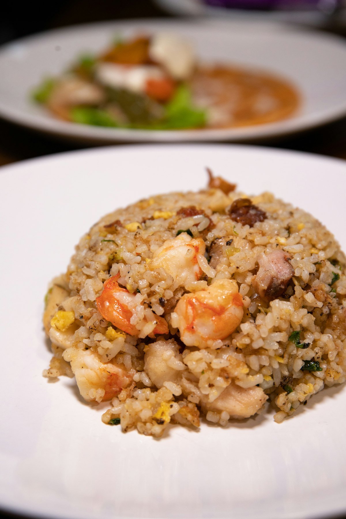Shrimp fried rice served on a white plate