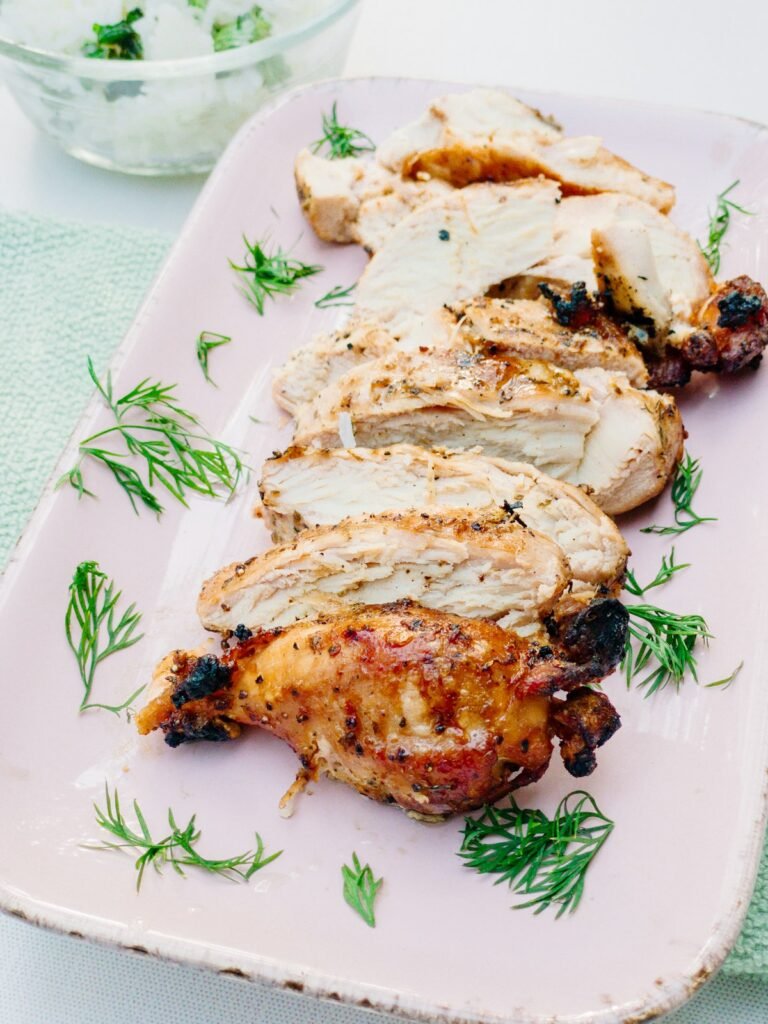 Sliced air fryer chicken breast with herbs